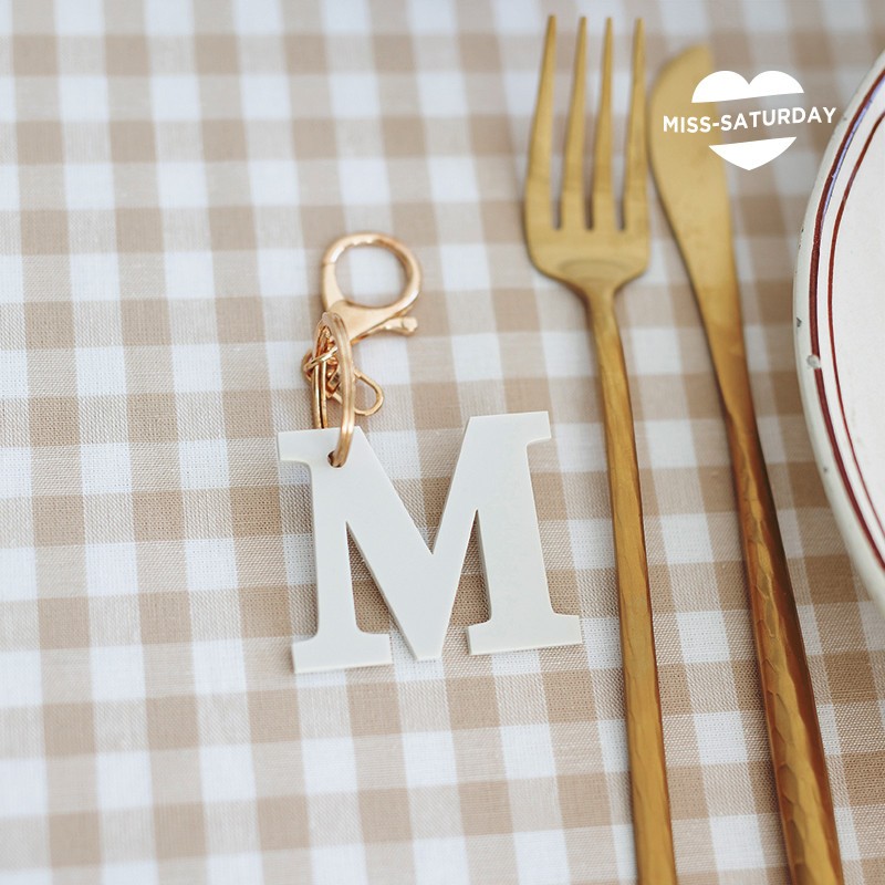 Llavero celebración inicial Theo