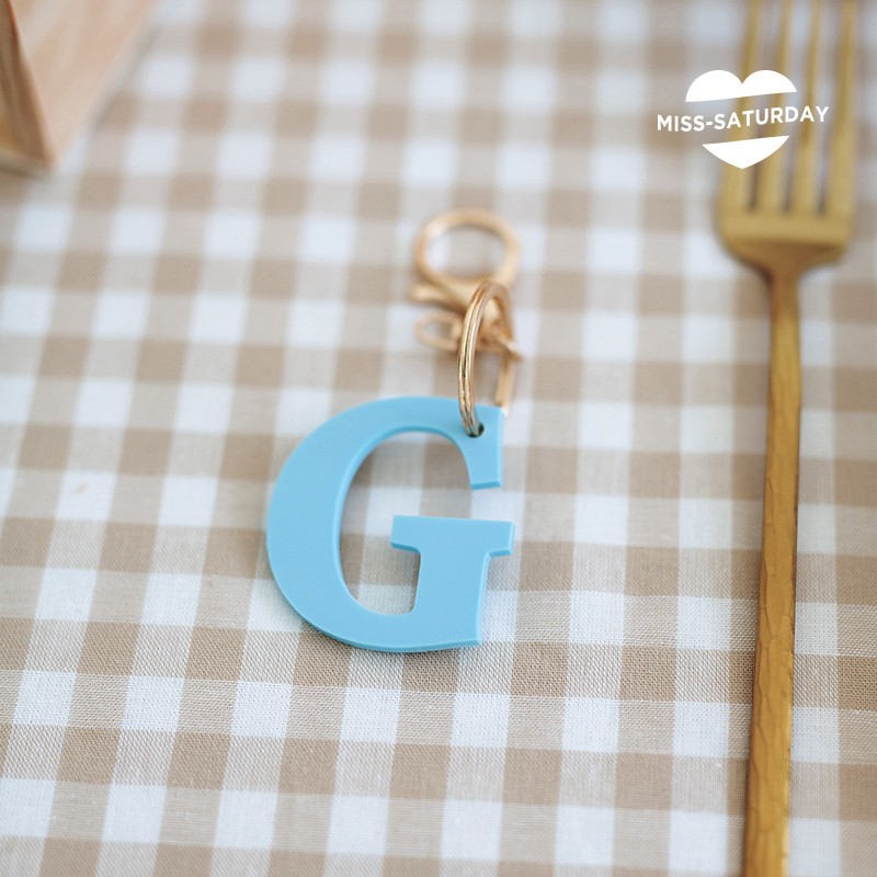 Llavero celebración inicial Theo