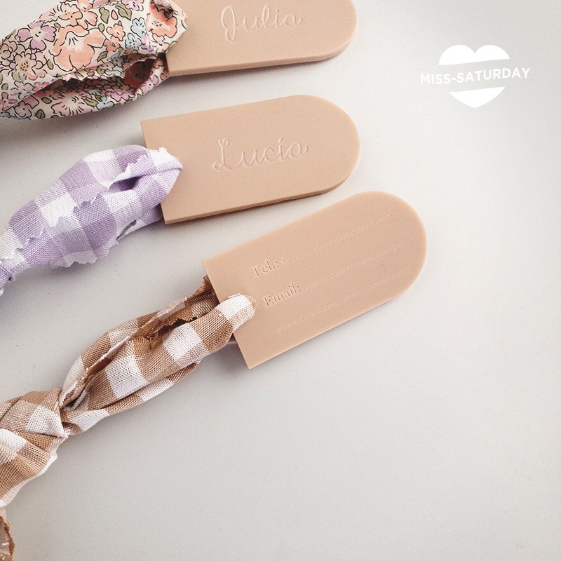 Identificador de maleta nude